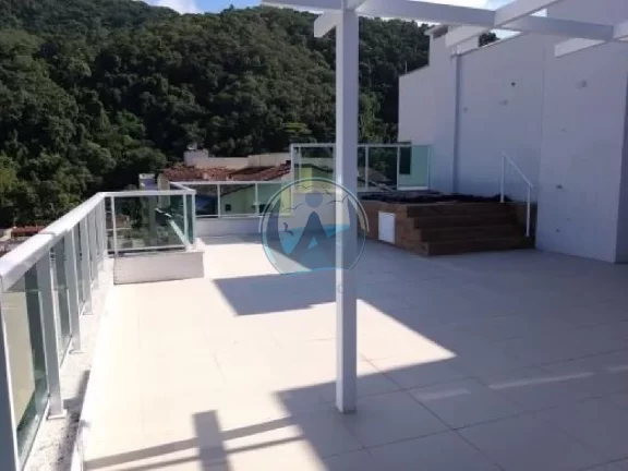 Imagem Cobertura de alto padrão à venda em Ubatuba-SP, no bairro Praia Grande: 3 quartos, 2 suítes, 194m² e 3 vagas de garagem!