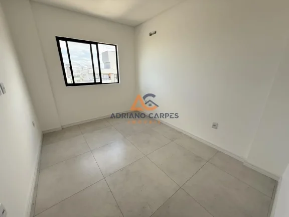 Imagem Apartamento novo, frente mar com 87m², 2 suítes e churrasqueira a carvão na Meia Praia - Navegantes Adriano Carpes Imóveis vende!