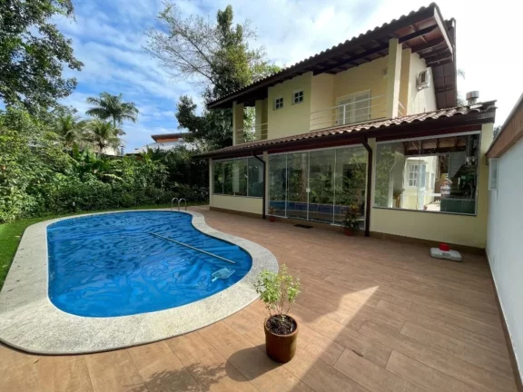 Imagem Imperdível Casa de Luxo à Venda em Riviera de São Lourenço Módulo 20: 4 Quartos, 4 Suítes, 2 Salas, 6 Vagas de Garagem!