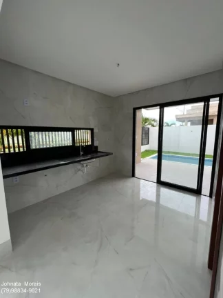 Imagem Casa de luxo no Terras Alphaville 2 - 3 suítes, piscina e lazer para crianças.