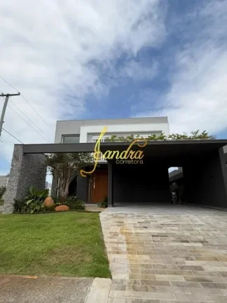 Imagem Sobrado condomínio fechado com 05 suítes e piscina beira lago