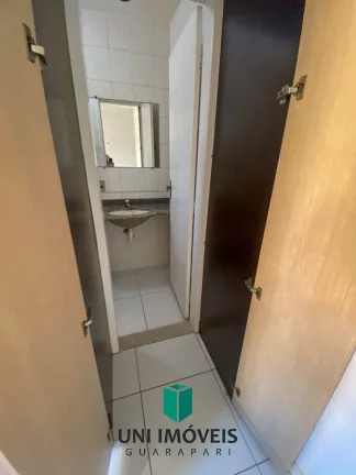 Imagem Apartamento Primeiro andar à Venda em Guarapari - Frente para rua - com área externa lateral