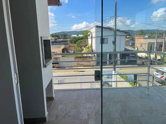 Imagem Geminado com 3 dormitórios sendo 1 suíte, sacada com churrasqueira e 1 vaga em Barra Velha