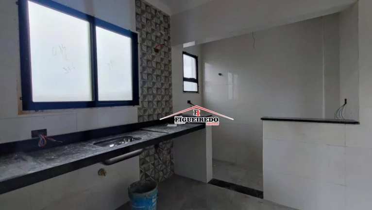 Imagem Casa com 3 dormitórios à venda, 90 m² por R$ 480.000 - Tude Bastos - Praia Grande/SP