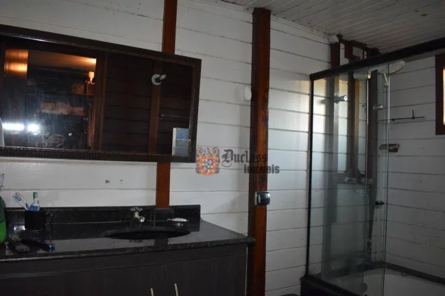 Imagem Casa com 3 dormitórios à venda, 280 m² por R$ 1.220.000 - Alto Do Capivari - Campos do Jordão/SP