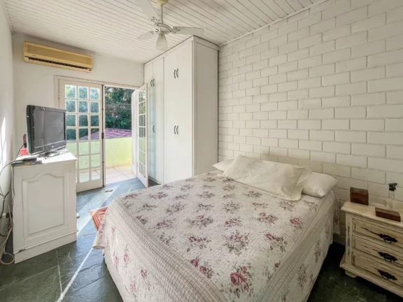 Imagem Casa de Luxo na Riviera de São Lourenço Módulo 20: 4 Quartos, 2 Suítes, 2 Salas e 4 Vagas de Garagem