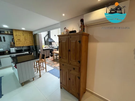 Imagem Casa em Juquehy para alugar - condomínio fechado com 5 suítes, 3 vagas, 100m da praia - Acomodação máx. 12 pessoas | Juquehy Imobiliária.