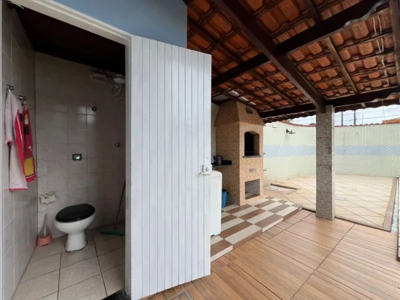 Imagem Casa para Venda em Praia Grande, Caiçara, 2 dormitórios, 1 suíte, 3 banheiros, 3 vagas