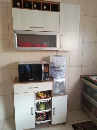 Imagem Sobrado com 2 dormitórios à venda, 79 m² por R$ 318.000 - Oceanópolis - Mongaguá/SP