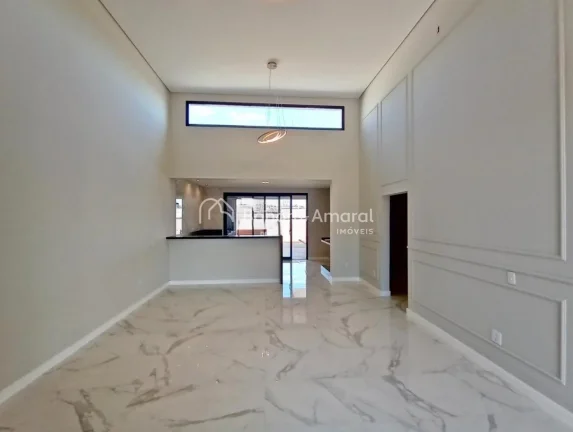 Imagem Com arquitetura moderna e ambientes aconchegantes, esta residência oferece um living integrado para...