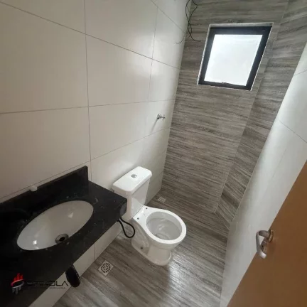 Imagem Sobrado com 2 dormitórios à venda, 57 m² por R$ 340.000,00 - Mirim - Praia Grande/SP