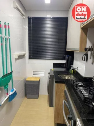 Imagem Apartamento com 2 dormitórios à venda, 45 m² por R$ 320.000,00 - Areia Branca - Santos/SP