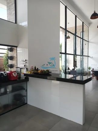 Imagem Casa de alto padrão a venda com 4 dormitórios, 360m² de área construída - Jardim Carolina em Ubatuba.