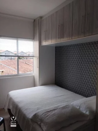 Imagem Lindo sobrado com 3 quartos sendo uma suíte, área gourmet com churrasqueira, 2 vagas de garagem á venda por R$ 549.000 - Uberaba - Curitiba.