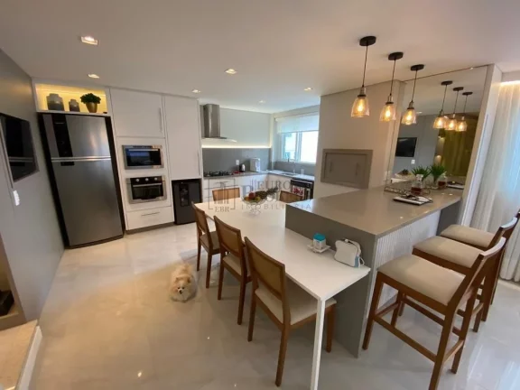 Imagem Apartamento com 4 dormitórios à venda em prédio Frente Mar no centro de Balneári