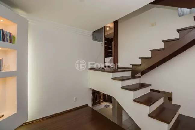 Imagem Casa em Condomínio 3 dorms à venda Avenida Vicente Monteggia, Cavalhada - Porto Alegre