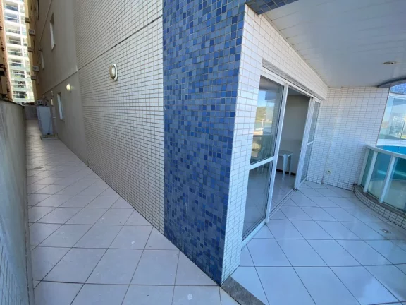 Imagem Em localização privilegiada da Praia do Morro de frente para o mar 3 quartos sendo duas suítes duas vagas de garagem