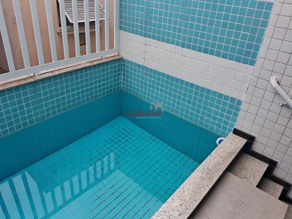Imagem Bela casa sobreposta duplex recém-construída em Santos no bairro da Aparecida com 3 dormitórios, uma suíte e piscina a venda por R$ 1.175.000,00.