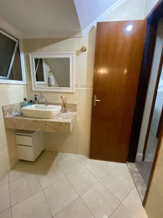 Imagem Sobrado Maravilhoso 3 Domrtorios sendo 3 Suites e 4 VAgsa de Garagens