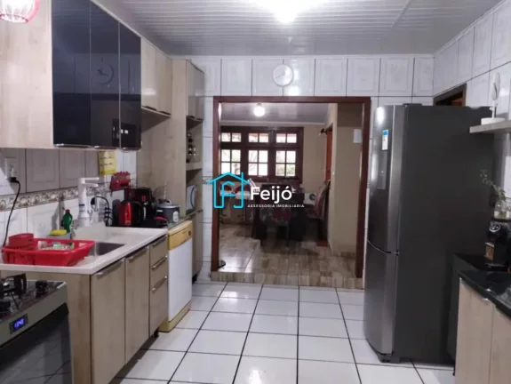 Imagem Casa 3 dormitórios com 1 suíte no Bairro Lami