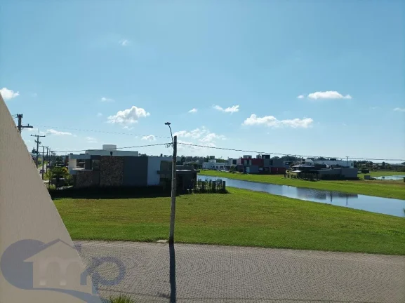 Imagem Casa à venda com 4 suítes no Reserva das Águas em Torres/RS