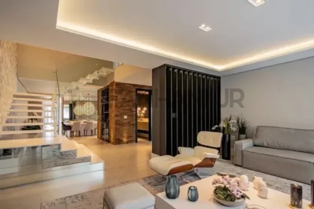 Imagem Luxuosa mansão de 4 quartos e 4 suítes no Jardim Europa, São Paulo-SP: 5 salas, 6 banheiros, 4 vagas, 415m². Venha conhecer!