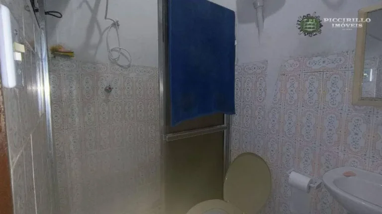 Imagem Casa com 3 dormitórios à venda, 240 m² por R$ 700.000,00 - Caiçara - Praia Grande/SP