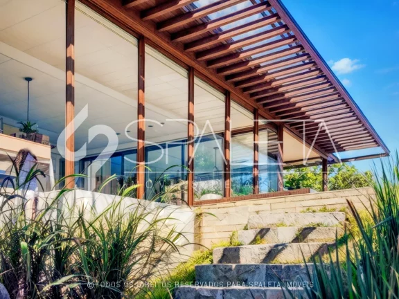 Imagem Casa de revista com vista livre para o lago e campo de golfe, disponível para venda na Fazenda da Grama em Itupeva