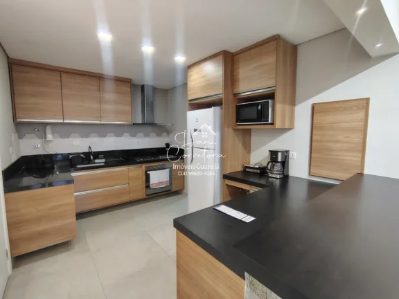 Imagem Apartamento atualizado e reformado com vista para o mar e lazer, 3 quartos com suíte e 2 vagas na Pitangueiras, Guarujá-SP - 165m² de área.