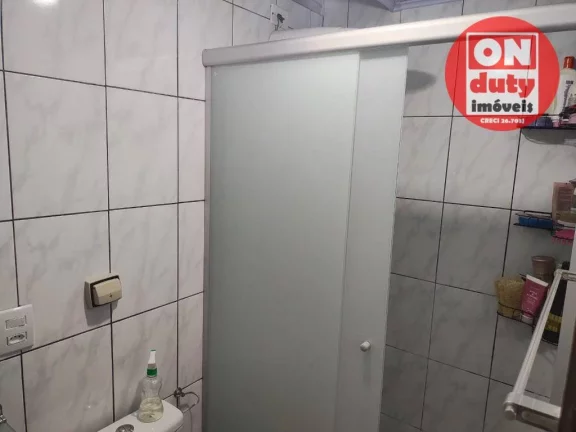 Imagem Apartamento com 2 dormitórios à venda, 64 m² por R$ 220.000,00 - Saboó - Santos/SP