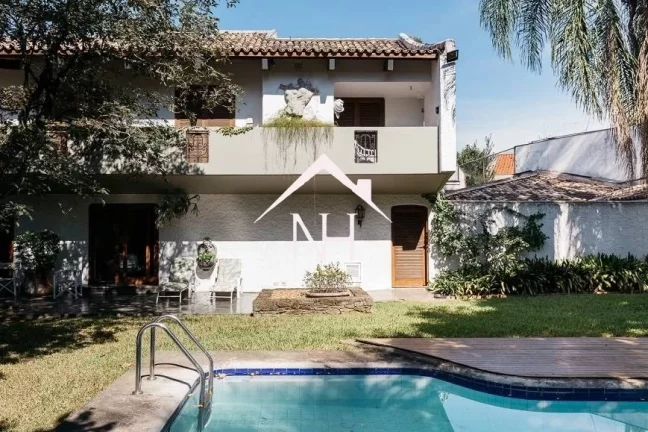 Imagem Casa a venda no Butantã com 560m², 5 quartos, 6 vagas, casa com piscina, casa com jardim.