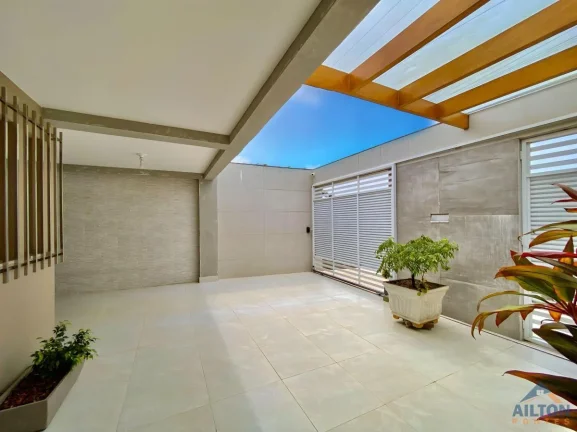 Imagem Casa Linear com 03 Quartos Alto Padrão à Venda na Praia do Morro - Guarapari/ES
