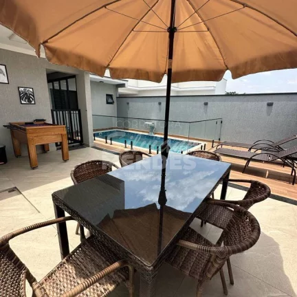 Imagem Casa com piscina aquecida no condomínio Santinon