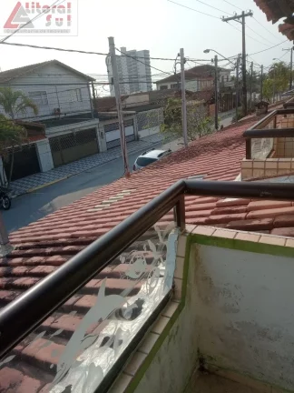 Imagem Casa à venda em Praia Grande-SP, bairro Maracanã: 2 quartos, 1 suíte, sala, 2 banheiros, 1 vaga e 75m² de área. Imperdível!