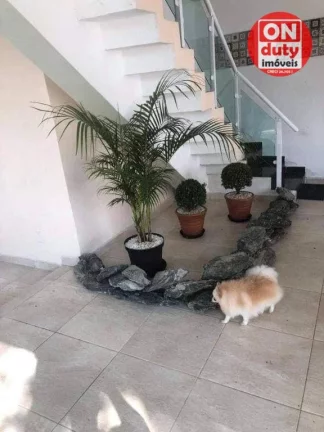 Imagem Belissímo Sobrado com 3 dormitórios à venda, 500 m² por R$ 2.850.000 - Jardim Virginia - Guarujá/SP