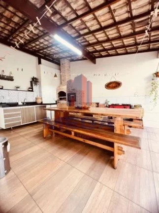 Imagem Linda Casa em Santos Dumont, 3 quartos, 2 vagas de garagem, toda mobiliada e varanda Gourmet!!!