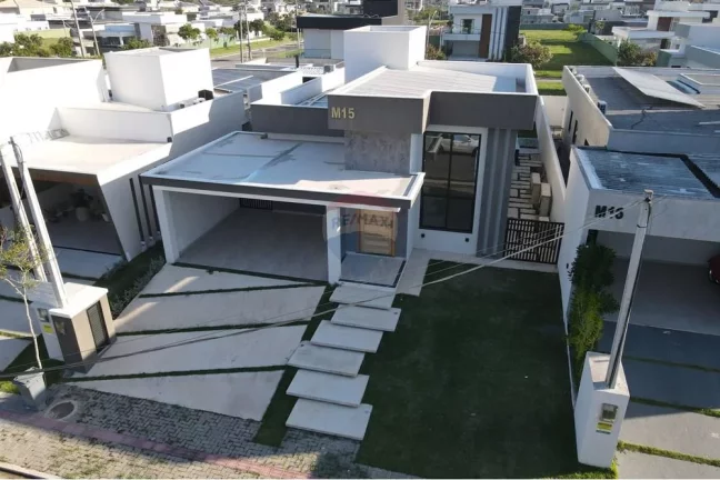 Imagem Casa em condomínio fechado com três quartos, sendo uma suíte