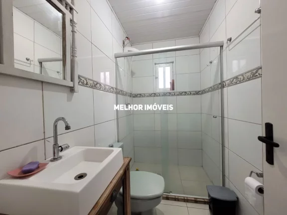 Imagem Casa com 03 dormitórios sendo 01 suíte com espaço de lazer com piscina à Venda em Sapucaia do Sul - RS