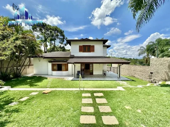 Imagem CASA 5 SUÍTES, SALÃO GOURMET, PISCINA, TERRENO 1.000m²,CONDOMÍNIO FECHADO
