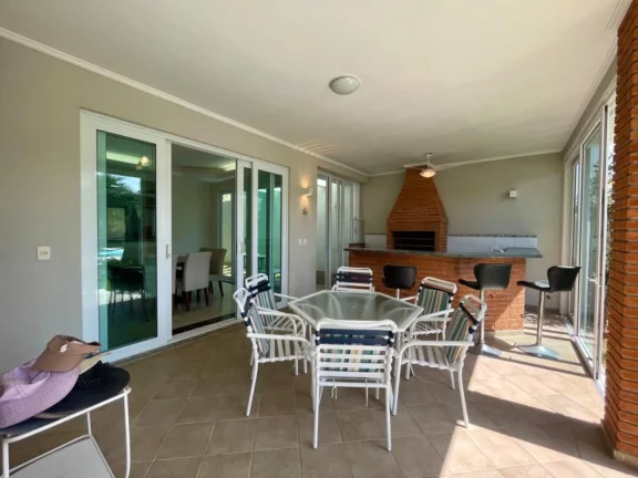 Imagem Casa à venda na Riviera de São Lourenço Módulo 03: 4 quartos, 4 suítes, 3 salas, 8 vagas de garagem e 329,74 m² de área.