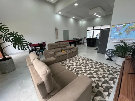Imagem CASA EM CONDOMINIO FECHADO COM 4 DORMITÓRIOS SENDO 4 SUÍTES,2 VAGAS DE GARAGEM,VARANDA GOURMET COM CHURRASQUEIRA E PISCINA.