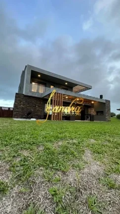 Imagem Sobrado Costa Serena, a beira do lago, condomínio beira mar com 04 suites mobiliado