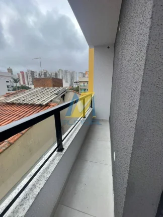 Imagem Apartamento com 2 dormitórios (1 suíte), sacada, elevador, 1 vaga. Novo