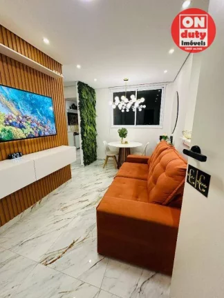 Imagem Apartamento com 2 dormitórios à venda, 46 m² por R$ 340.000,00 - Areia Branca - Santos/SP