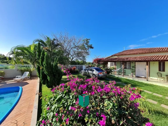 Imagem Linda casa com piscina, jardim e 902m² de terreno a venda na Enseada Verde - Guarapari