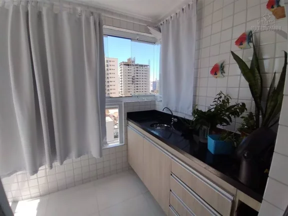 Imagem Apartamento na Vila Tupi, 1 Quarto com Sacada Gourmet, 53m² de área útil.