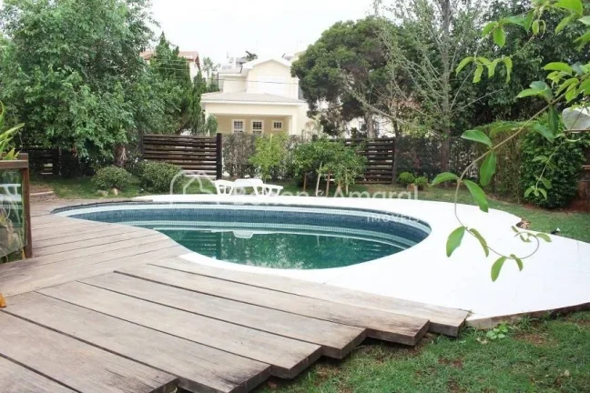 Imagem Casa em condomínio com 1000 m² e 7 quartos