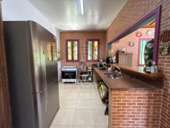 Imagem Casa Ampla em Condomínio Fechado Conforto, Espaço e Lazer a Poucos Minutos da Praia