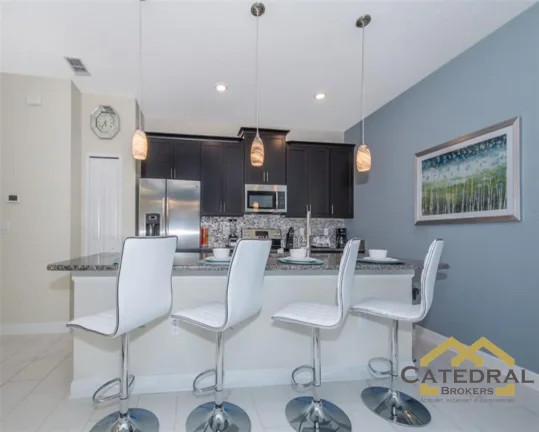 Imagem Casa com piscina totalmente mobiliada por US$550.000,00 (Dólar Americano) em Kissimmee - Flórida/EUA