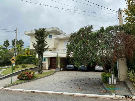 Imagem Melville Belíssima Casa de Esquina de 462m² com 4 Suítes e 6 Vagas de Garagem